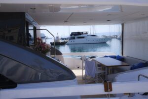 View from the aft deck of a charter yacht moored in a marina
