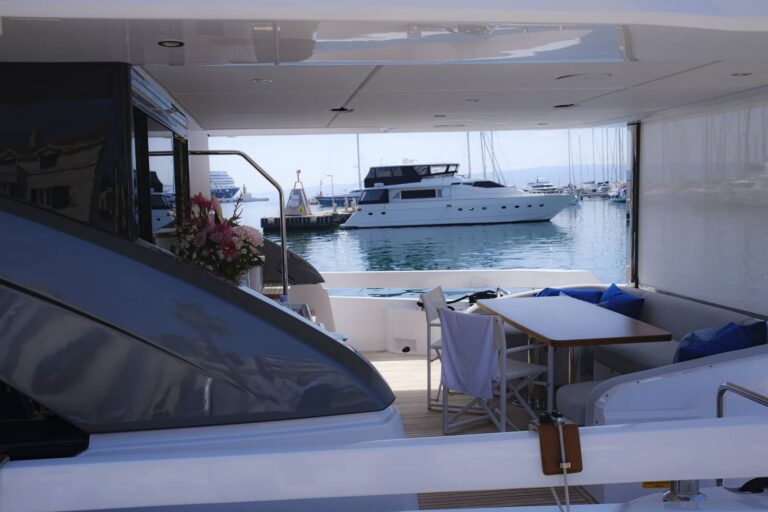 View from the aft deck of a charter yacht moored in a marina