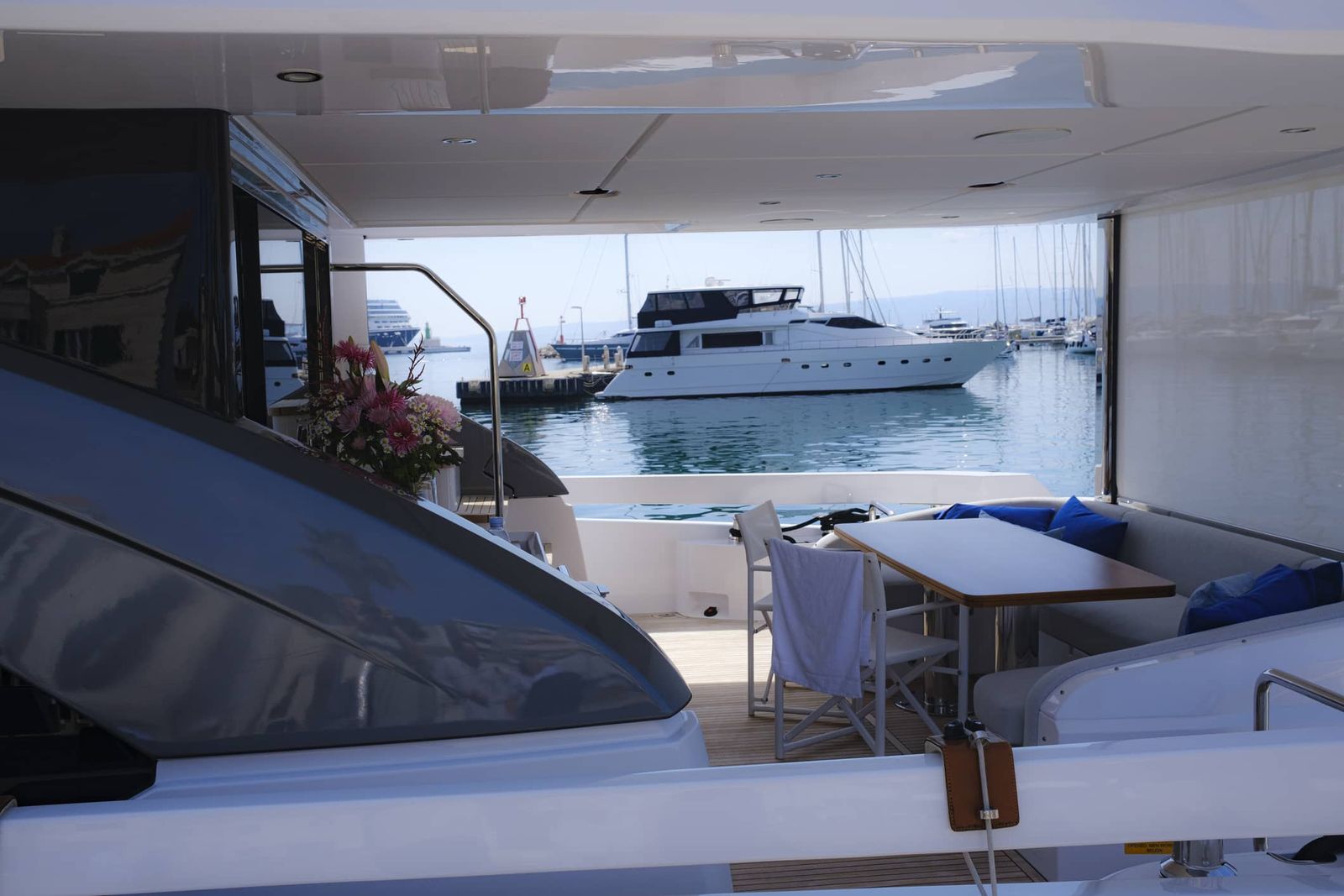 View from the aft deck of a charter yacht moored in a marina