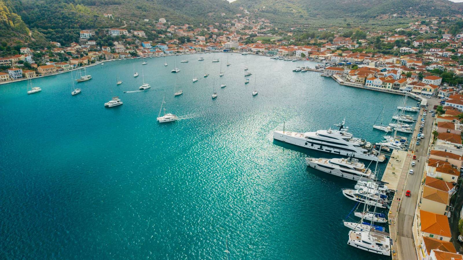 Yachts anchored and moored in Vathy harbour, Ithaca, in the Ionian Sea
